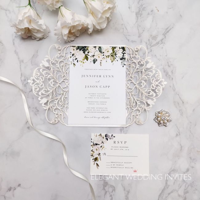 elegnat ivory and white flowers and greenery pattern laser cut invitation