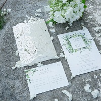evelyn’s garden lush greenery inspired invitation with ivory shimmer laser cut wrap EWDS001