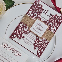 grand entrance – burgundy laser cut wrap with classic invitation and glittery belly band EWWS237
