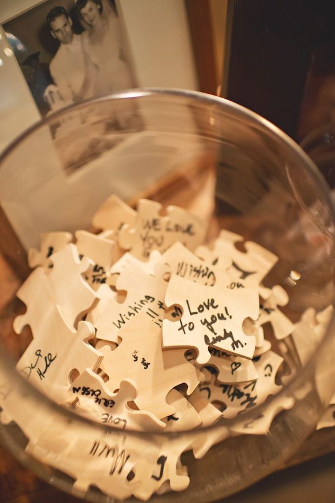 creative puzzled wedding guest book idea with glass jar