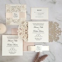 classy ivory laser cut wedding invitations with mirror belly band and tag ewws290