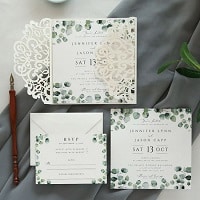 ivory laser cut wrap invitation with green botanical touches ewds005 2 1