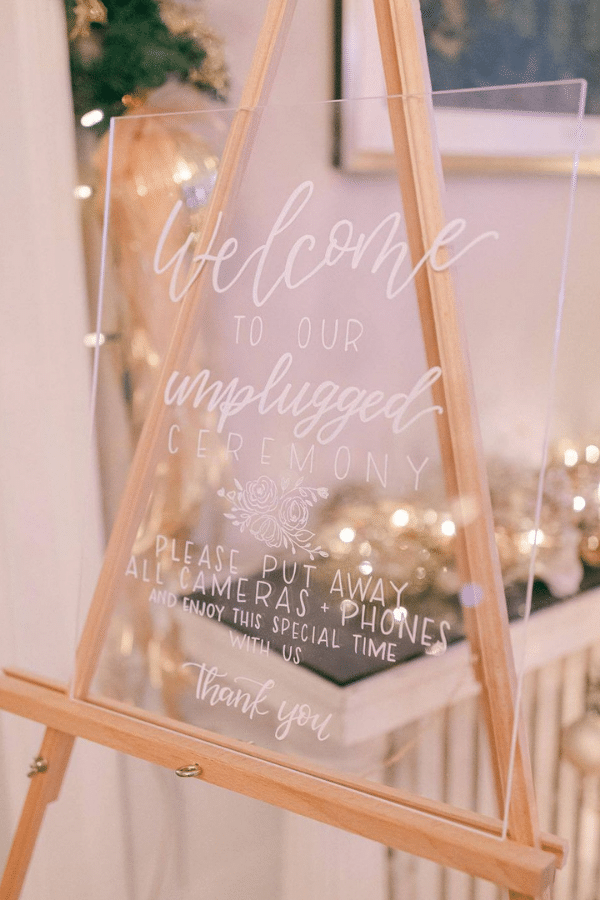 simple clear white wedding welcome sign in acrylic